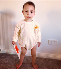 Here Comes The Sun Organic Cotton Romper.