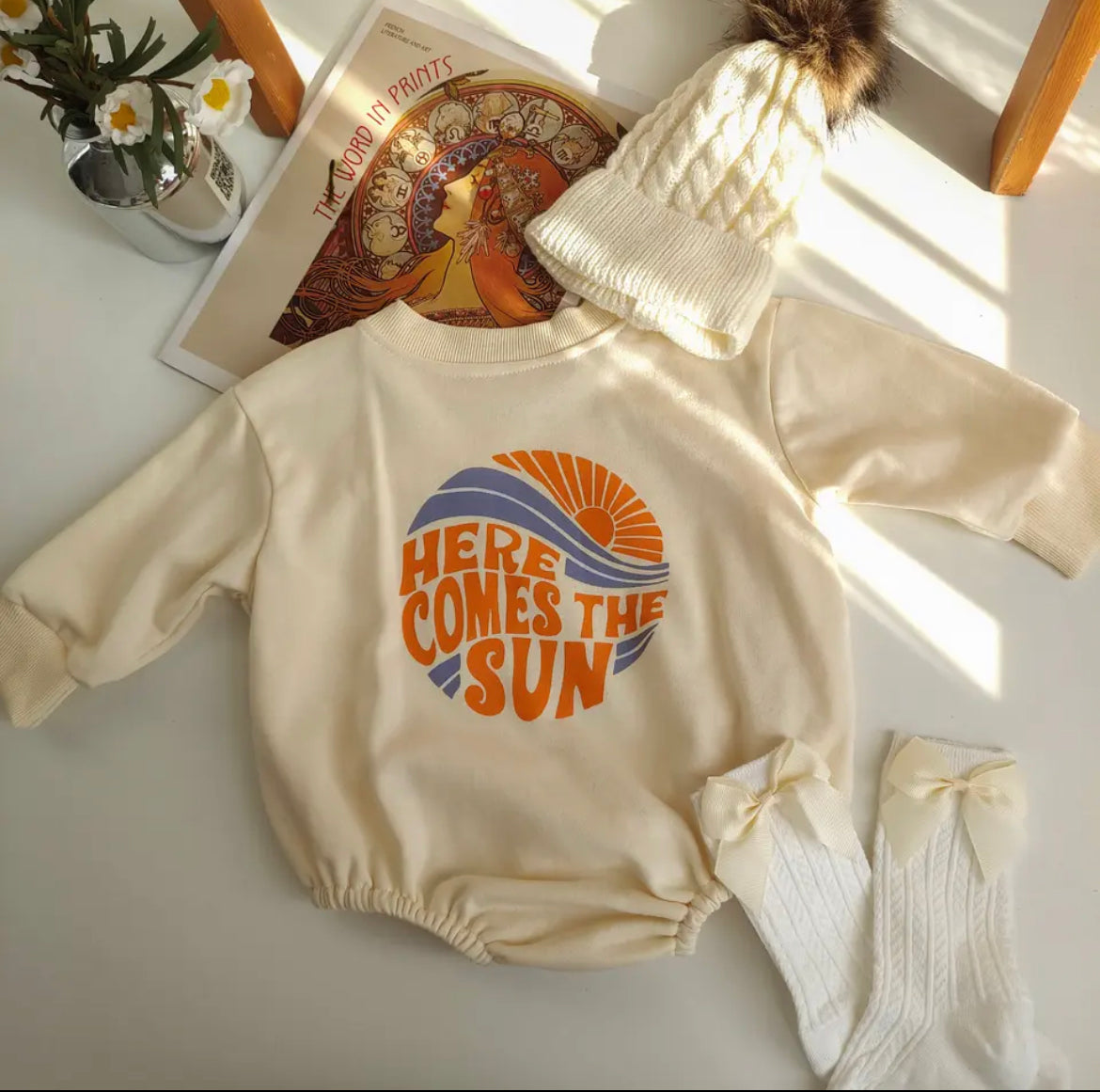 Here Comes The Sun Organic Cotton Romper.