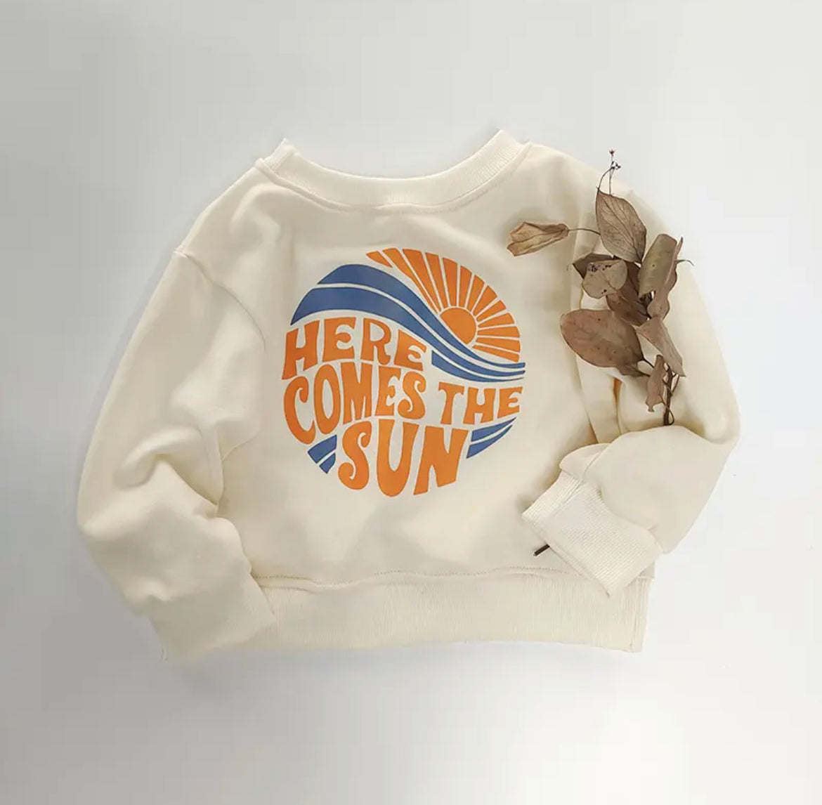 Here Comes The Sun Organic Cotton Romper.