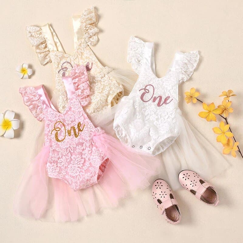 Lacey - Baby Girls First Birthday Lace Romper + Glitter One.