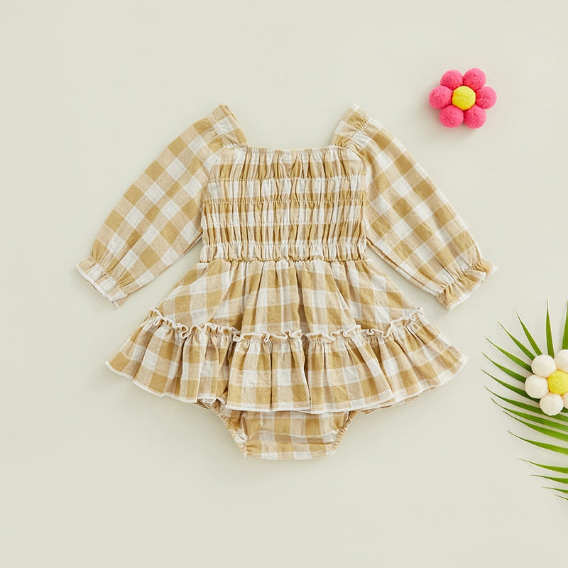 Nerida  - Gingham Ruched Long Sleeve Romper Nerida  - Gingham Ruched Long Sleeve Romper.