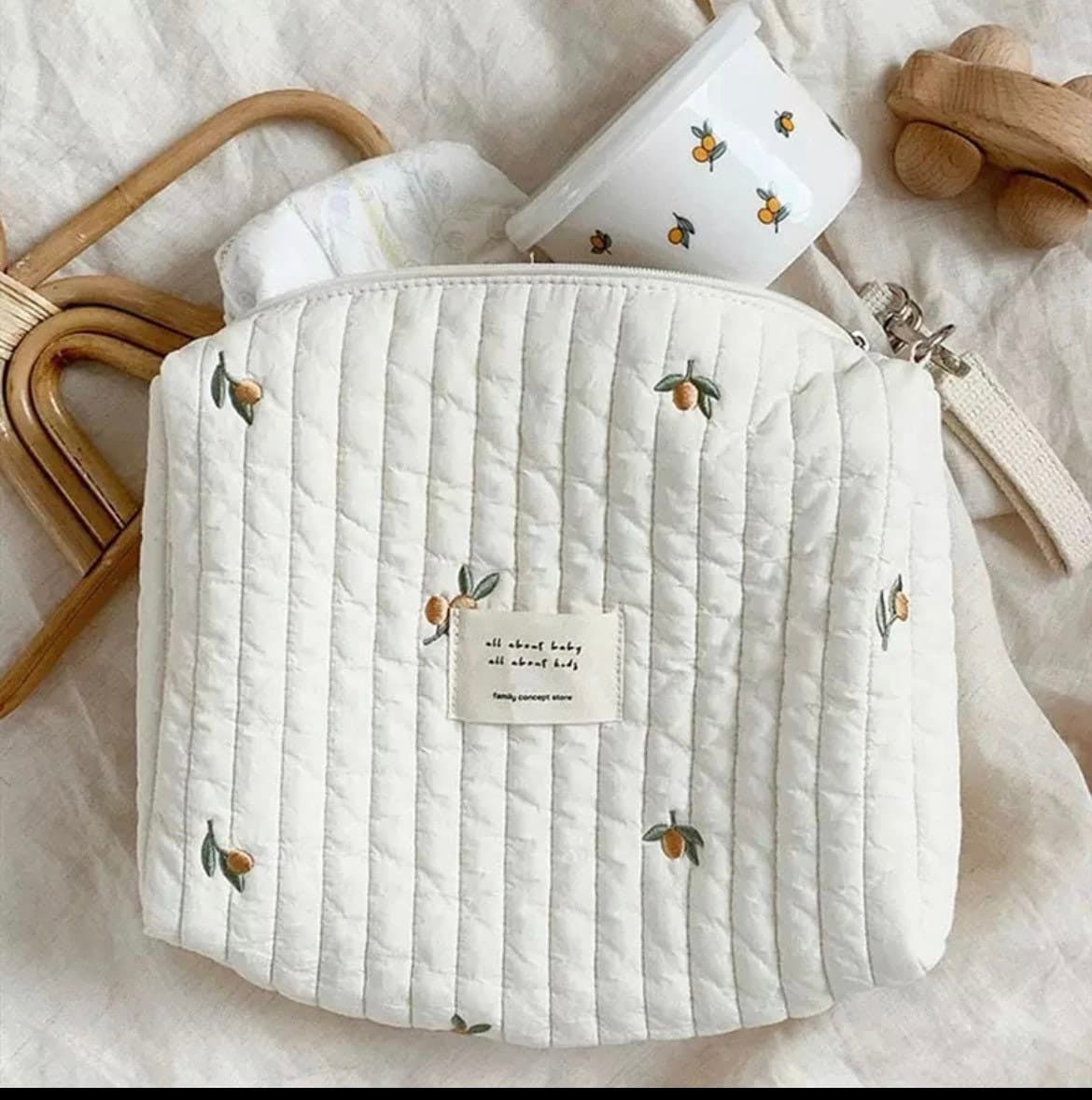 Stylish Small Quilted and Embroidered Pram/ Stroller Nappy/Diaper Bag-Happy baby, happy mummy!
Make your outings with your baby easy and nappy changing an enjoyable experience .
Get organised with this stunning quilted baby bag for you-Bijou Bubs